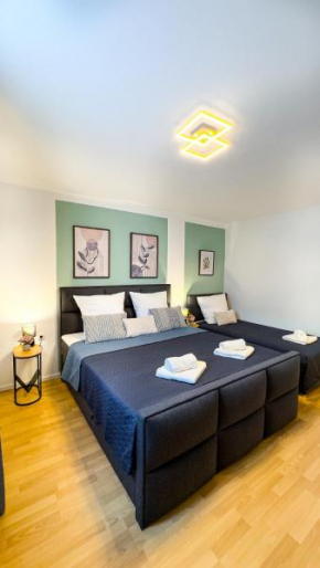 Charmantes 3-Zi-Apartment am Schlössle in Lechhausen-Garage-Balkon-Küche-Smart TV